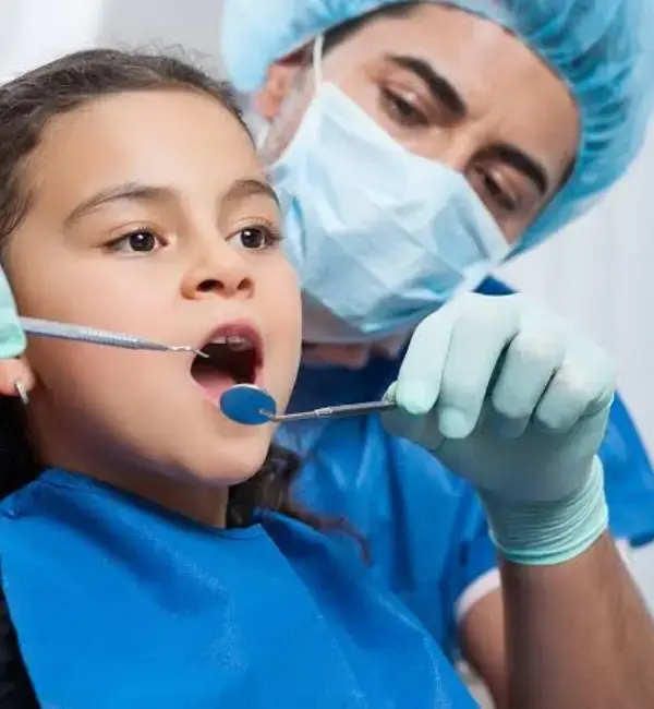 Child receiving gentle dental checkup