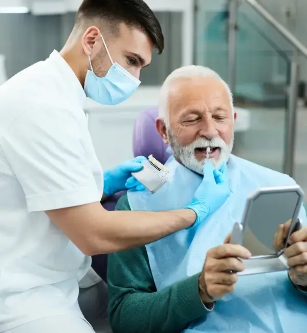 Senior receiving professional dental care