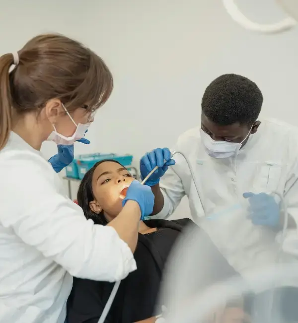 Professional dental checkup with patient